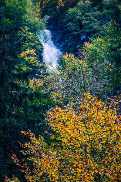 Autumn in Val Raccolana. Waterfalls and streams. Julian Alps and Fontanone di Goriuda