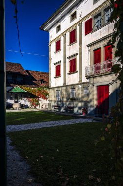 Autumn in Val Degano. Ovaro and its characteristic villages. The houses with a hundred windows clipart