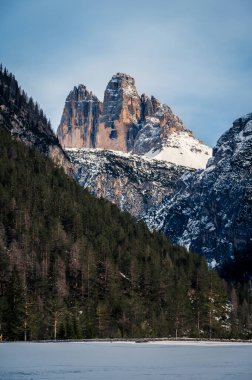  Three peaks of Lavaredo, Antorno and Monte Paterno in  Dolomites. clipart