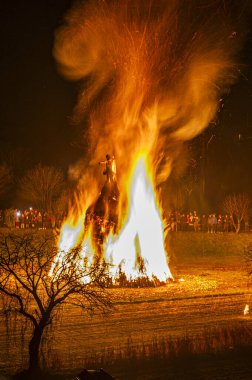 Traditional fire and epiphany fireworks in Friuli. clipart