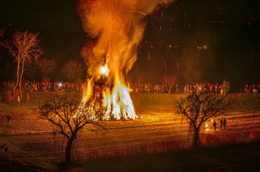 Traditional fire and epiphany fireworks in Friuli. clipart