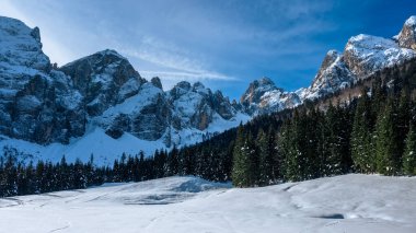 Tarvisio. Riofreddo valley in winter at the foot of the Julian Alps clipart