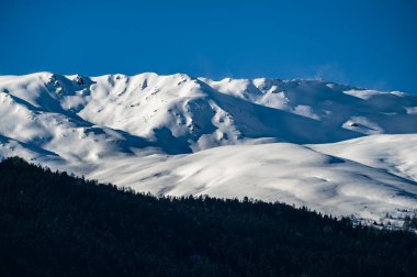 Resia Lake. Curon. The wonder of the Venosta Valley in winter. clipart