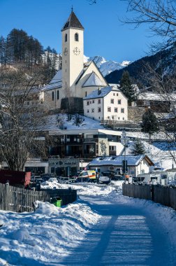 Resia Lake. Curon. The wonder of the Venosta Valley in winter. clipart