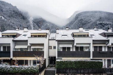 Scenic winter day in San Candido. Magical Val Pusteria under the snow at Christmas time clipart