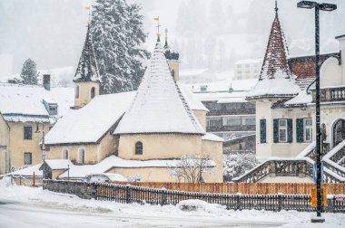 Scenic winter day in San Candido. Magical Val Pusteria under the snow at Christmas time clipart