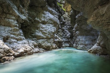 Spectacle of unspoiled nature. Gorge of the Raccolana stream. Chiusaforte. Friuli clipart