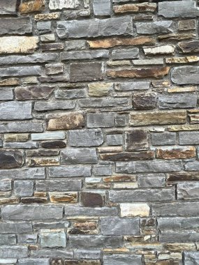 Duvar çeşitli şekillerde, boyutlarda ve renklerde bir taş yaptı. Arkaplan dokusu deseni