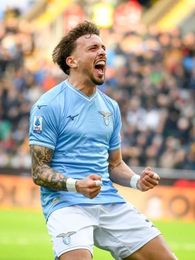 Lazio 'nun Luca Pellegrini portre mutluluğu İtalyan futbolu Serie A maçında Udinese Calcio, Friuli-Dacia Arena stadyumunda SS Lazio' ya karşı, 7 Ocak 2024 - Fotoğraf: Ettore Griffoni
