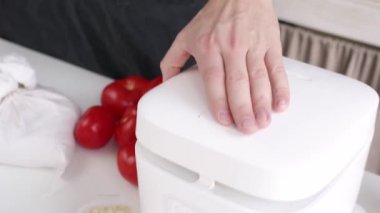 Smart home devices. cooking rice using Electric rice cooker