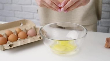 Woman mixing dough, making apple pie