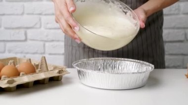 Woman mixing dough, making apple pie