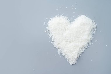 Close up of white soy wax for candle making. Light texture of soy wax flakes. Ingredient for homemade candles. Ecological lifestyle