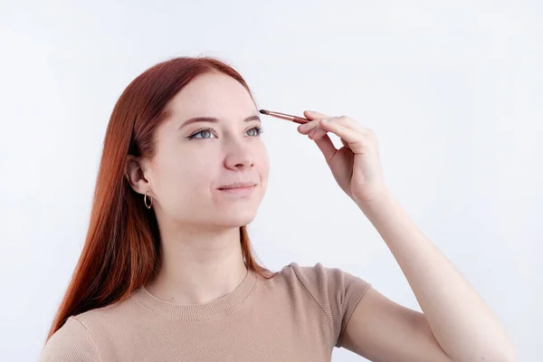 Joyful Redhead Young Woman Using Makeup Brush Making Isolated White — Stock Photo, Image
