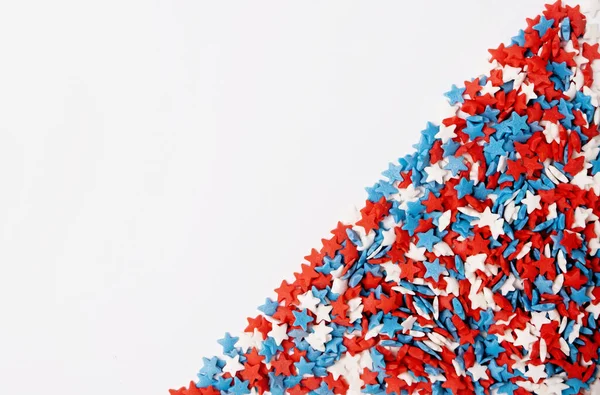 stock image 4th of July American Independence Day sprinkles decorations frame on white background, mockup