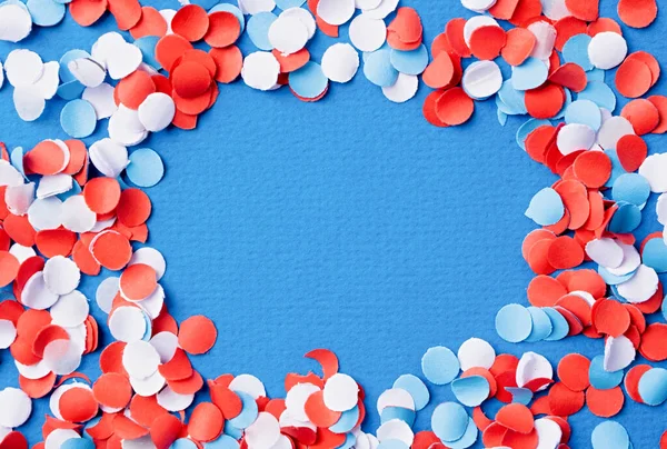 4th of July American Independence Day, colorful circle shape confetti from shredded paper, frame