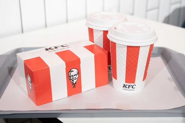 stock image Yerevan, Armenia - April 25, 2023: KFC fried chicken bucket and drinks, boxes and cups