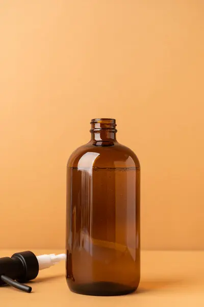 Recycled plastic pump bottle for mock-up. Minimalism brand packaging mockup design on beige