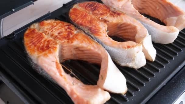 Woman Cooking Salmon Steaks Modern Electric Grill Kitchen — Stock Video