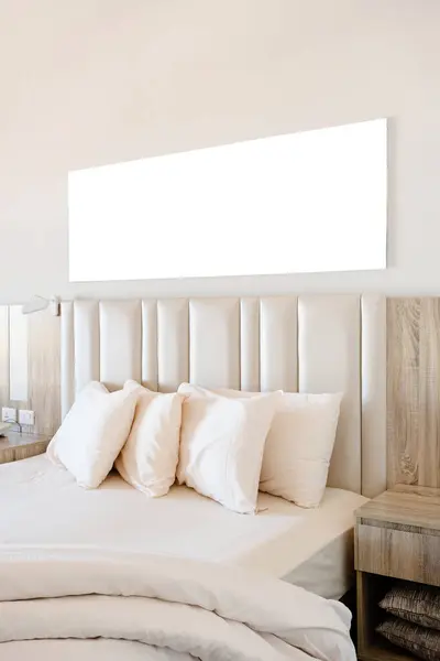 Hotel room Interior with blank white frame for mockup design