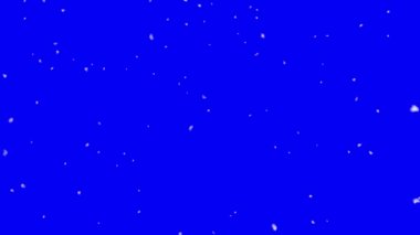 Mavi ekranın önüne kar taneleri düşüyor