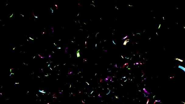 Kleurrijke Confetti Vallen Een Zwarte Groene Blauwe Witte Achtergrond — Stockvideo