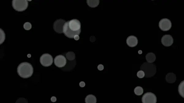 Siyah arkaplan üzerinde beyaz daireler bokeh parçacıkları soyut arkaplan.