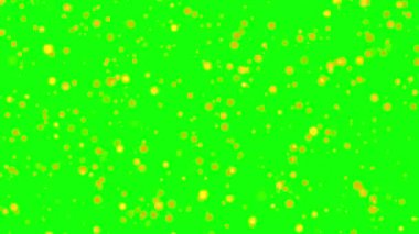 Altın parıltılı parçacıkları döngüye sok. Yeşil, beyaz arkaplanda düşen parçacıklar
