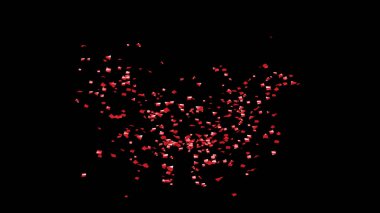 Kırmızı Konfeti siyah arka planda patlıyor.