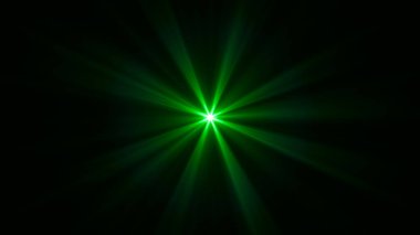Parlayan yıldız. Koyu arkaplanda yanıp sönen yeşil ışık.