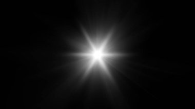 Siyah arka planda parlak beyaz bir yıldız parlar.. 