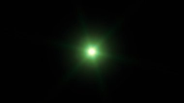 Parlayan yeşil ışığın ışık efekti. Güneş patlaması. Işık efekti. Yıldız patlamaları