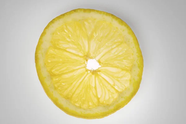 Макроизображение Лимонного Ломтика Просияло Сквозь — стоковое фото