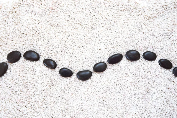 Zen pattern in white sand