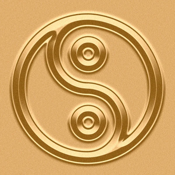 stock image Yin Yang Symbol in sand background