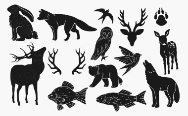 Çeşitli orman hayvanlarının ve kuşların resimli siyah siluetleri..