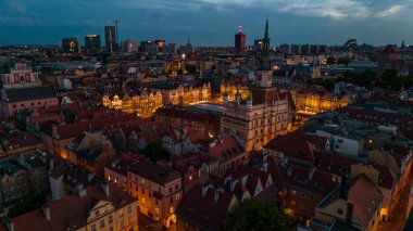 aerial view of the historical center of the city of poznan in poland in the spring at sunset clipart