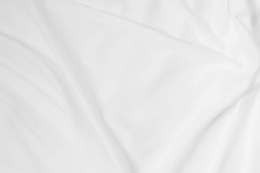 Yumuşak odaklı beyaz dalgalı keten kumaş dokusu arkaplanı