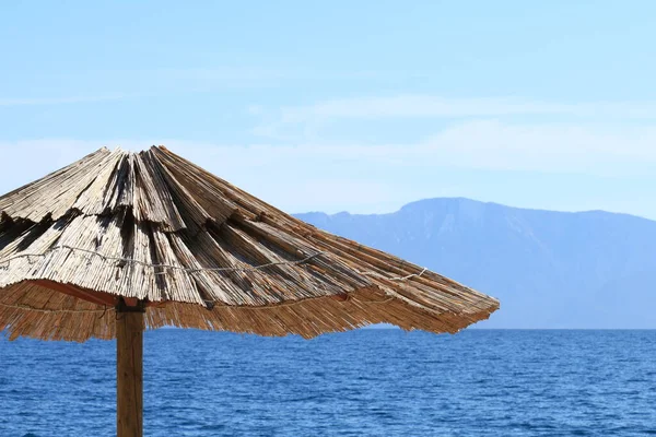Wooden Umbrella Blue Sea Croatia Drvenik — Stock Photo, Image
