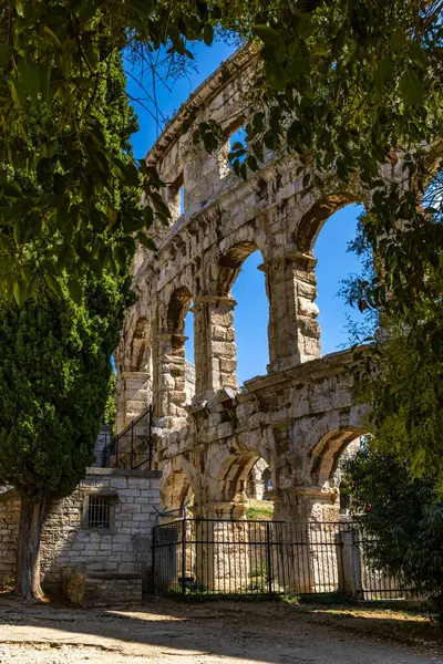 Amphitheater in Pula, gladiator fighting arena, monuments in Croatia