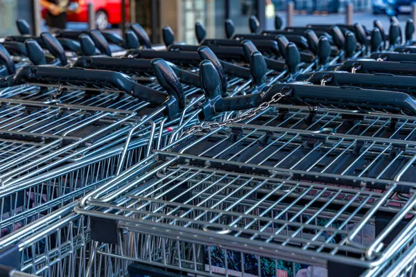 Stock image Shopping carts in front of a hypermarket Europe