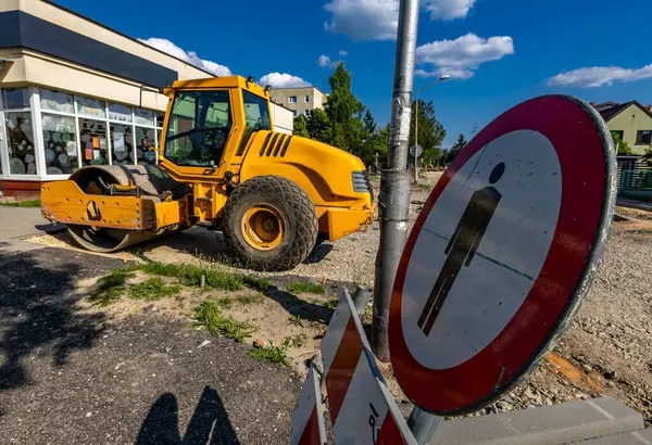 stock image Heavy construction equipment road roller while working on road construction on stree