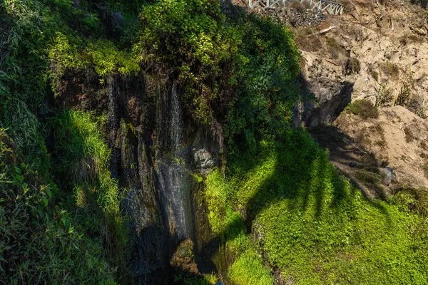 stock image Located in Los Realejos in the north of Tenerife, Rambla de Castro, Playa de Castro, a beach with a waterfall on the Atlantic Ocea