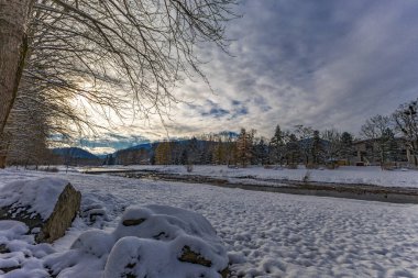 Winter in the mountains, a winter walk, landscape by the Vistula River in Ustron clipart