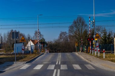 Cars entered the railway crossing with the red light on, accident at the crossing, red warning signal on the tracks, approaching trai clipart