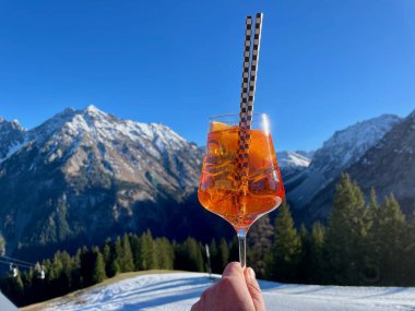 Apres-ski cocktail, after ski, in Austrian Alps. Vorarlberg, Austria. High quality photo