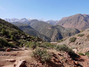 Panoramic view of snow-capped High Atlas Mountains in Ourika valley, Morocco. High quality photo