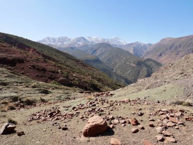 Panoramic view of snow-capped High Atlas Mountains in Ourika valley, Morocco. High quality photo