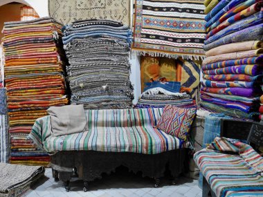 Colorful Berber carpets in shop in Medina of Marrakech, Morocco. High quality photo