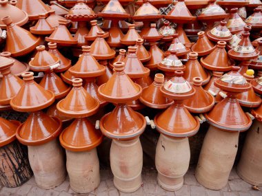 Earthenware tajine pots for sale in souk of Marrakech, Morocco. High quality photo